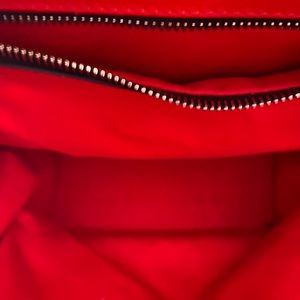 Backpack only worn once, brand new and official.